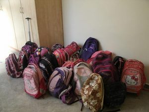 The tote bags of our children in their home after coming from school