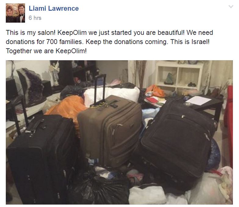  Liami Lawrence, founder of the KeepOlim Movement, shares a photo of his living room, now full of cloths and more, donated by generous citizens around the country